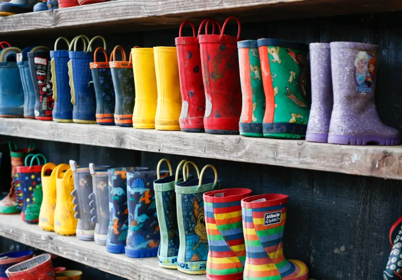 lots of little wellies lined up on shelves